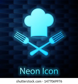 Glowing neon Chef hat and crossed fork icon isolated on brick wall background. Cooking symbol. Restaurant menu. Cooks hat. Vector Illustration Glowing neon Chef hat and crossed fork icon isolated on brick wall background. Cooking symbol. Restaurant menu. Cooks hat. Vector Illustration