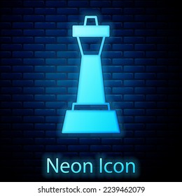 Glowing neon Chess icon isolated on brick wall background. Business strategy. Game, management, finance.  Vector