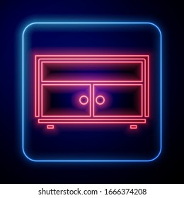 Glowing neon Chest of drawers icon isolated on blue background.  Vector Illustration