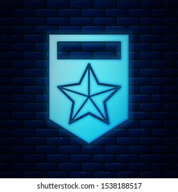 Glowing neon Chevron icon isolated on brick wall background. Military badge sign.  Vector Illustration