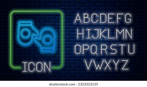 Glowing neon Christmas mitten icon isolated on brick wall background. Merry Christmas and Happy New Year. Neon light alphabet. Vector