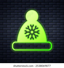 Glowing neon Christmas Santa Claus hat icon isolated on brick wall background. Merry Christmas and Happy New Year.  Vector