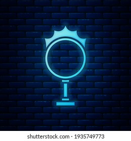 Glowing neon Circus fire hoop icon isolated on brick wall background. Ring of fire flame. Round fiery frame.  Vector