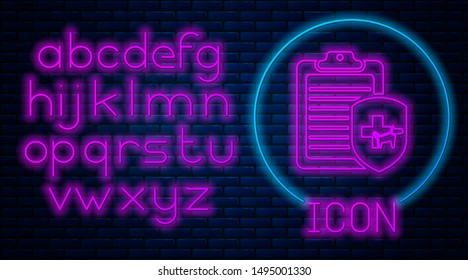 Glowing neon Clipboard with medical clinical record pet icon isolated on brick wall background. Health insurance form. Medical check marks report. Neon light alphabet. Vector Illustration