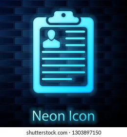 Glowing neon Clipboard with resume and man silhouette icon isolated on brick wall background. CV application. Curriculum vitae, job application form with profile photo concept. Vector Illustration