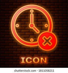 Glowing neon Clock delete icon isolated on brick wall background. Time symbol. Vector.