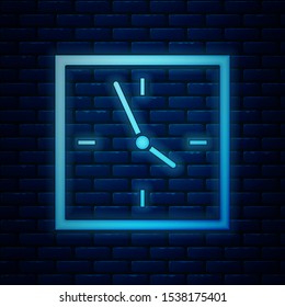 Glowing neon Clock icon isolated on brick wall background. Time symbol.  Vector Illustration