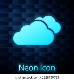 Glowing neon Cloud icon isolated on brick wall background. Vector Illustration