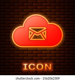 Glowing neon Cloud mail server icon isolated on brick wall background. Cloud server hosting for email. Online message service. Mailbox sign.  Vector Illustration