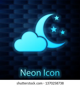 Glowing neon Cloud with moon and stars icon isolated on brick wall background. Cloudy night sign. Sleep dreams symbol. Night or bed time sign. Vector Illustration