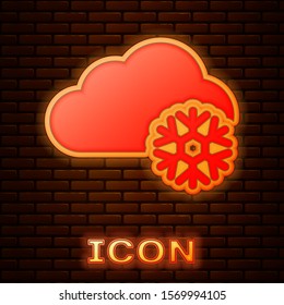 Glowing neon Cloud with snow icon isolated on brick wall background. Cloud with snowflakes. Single weather icon. Snowing sign.  Vector Illustration