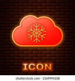 Glowing neon Cloud with snow icon isolated on brick wall background. Cloud with snowflakes. Single weather icon. Snowing sign.  Vector Illustration