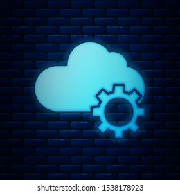 Glowing neon Cloud technology data transfer and storage icon isolated on brick wall background. Adjusting, service, setting, maintenance, repair, fixing.  Vector Illustration