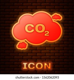 Glowing neon CO2 emissions in cloud icon isolated on brick wall background. Carbon dioxide formula symbol, smog pollution concept, environment concept.  Vector Illustration