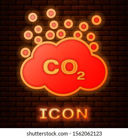 Glowing neon CO2 emissions in cloud icon isolated on brick wall background. Carbon dioxide formula symbol, smog pollution concept, environment concept.  Vector Illustration