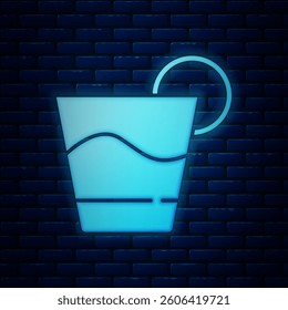 Glowing neon Cocktail icon isolated on brick wall background.  Vector