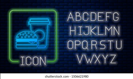 Glowing neon Coffee and burger icon isolated on brick wall background. Fast food symbol. Neon light alphabet. Vector Illustration