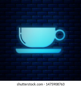 Glowing neon Coffee cup flat icon isolated on brick wall background. Tea cup. Hot drink coffee.  Vector Illustration