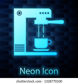 Glowing neon Coffee machine and coffee cup icon isolated on brick wall background. Vector Illustration