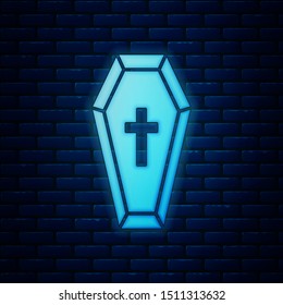 Glowing neon Coffin with christian cross icon isolated on brick wall background. Happy Halloween party.  Vector Illustration