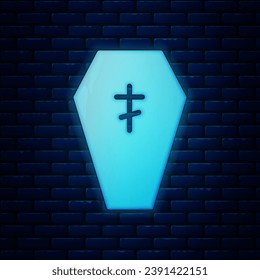 Glowing neon Coffin with christian cross icon isolated on brick wall background. Happy Halloween party.  Vector