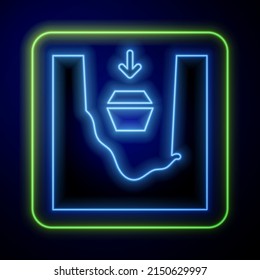 Glowing neon Coffin in grave icon isolated on blue background. Funeral ceremony.  Vector