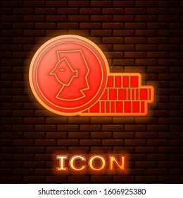 Glowing neon Coin for game icon isolated on brick wall background.  Vector Illustration