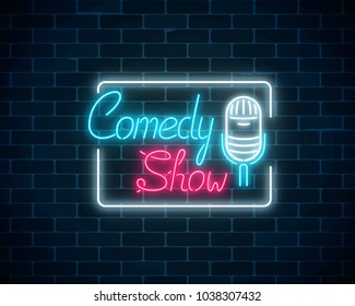 Glowing neon comedy show sign with retro microphone in rectangle frame on a brick wall background. Humor monolog glowing signboard. Vector illustration.