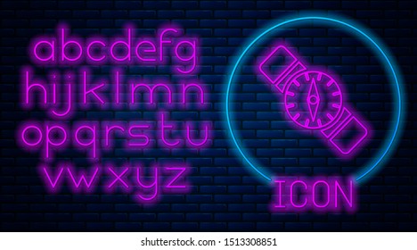 Glowing neon Compass icon isolated on brick wall background. Windrose navigation symbol. Wind rose sign. Neon light alphabet. Vector Illustration