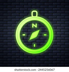 Glowing neon Compass icon isolated on brick wall background. Windrose navigation symbol. Wind rose sign.  Vector