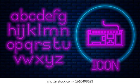 Glowing neon Computer keyboard icon isolated on brick wall background. PC component sign. Neon light alphabet. Vector Illustration