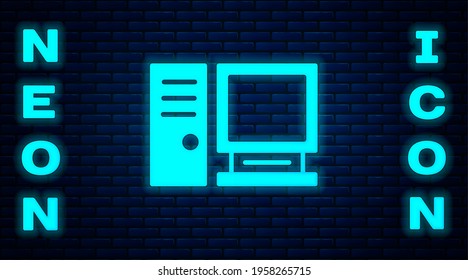 Glowing neon Computer monitor icon isolated on brick wall background. PC component sign.  Vector Illustration