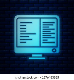 Glowing neon Computer monitor screen icon isolated on brick wall background. Electronic device. Front view.  Vector Illustration