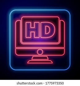 Glowing neon Computer PC monitor display with HD video technology icon isolated on blue background.  Vector Illustration