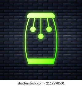 Glowing neon Conga drums icon isolated on brick wall background. Musical instrument.  Vector