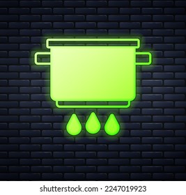 Glowing neon Cooking pot on fire icon isolated on brick wall background. Boil or stew food symbol.  Vector