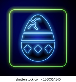 Glowing neon Cracked egg icon isolated on blue background. Happy Easter.  Vector Illustration