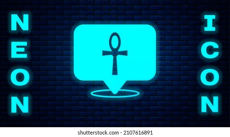 Glowing neon Cross ankh icon isolated on brick wall background. Egyptian word for life or symbol of immortality.  Vector