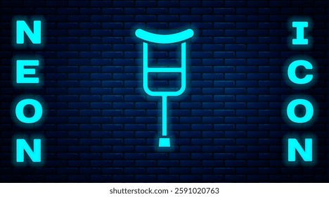 Glowing neon Crutch or crutches icon isolated on brick wall background. Equipment for rehabilitation of people with diseases of musculoskeletal system.  Vector