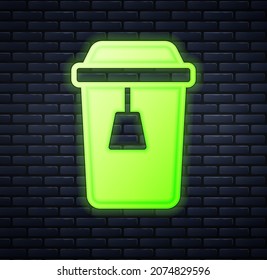 Glowing neon Cup of tea icon isolated on brick wall background.  Vector
