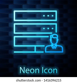 Glowing neon Customer care server icon isolated on brick wall background. Tech support concept with male operator. Call center sign. Vector Illustration