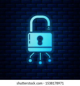 Glowing neon Cyber security icon isolated on brick wall background. Closed padlock on digital circuit board. Safety concept. Digital data protection.  Vector Illustration