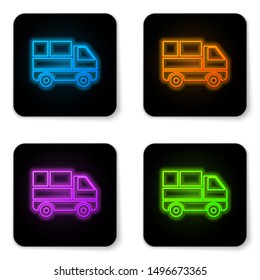 Glowing neon Delivery truck with cardboard boxes behind icon isolated on white background. Black square button. Vector Illustration