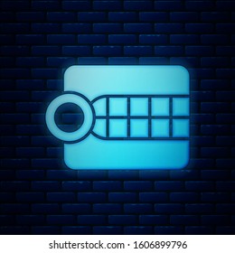 Glowing neon Dentures model icon isolated on brick wall background. Dental concept.  Vector Illustration