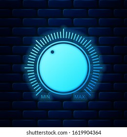 Glowing neon Dial knob level technology settings icon isolated on brick wall background. Volume button, sound control, music knob with number scale, analog regulator.  Vector Illustration