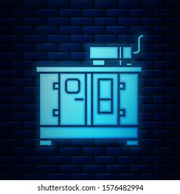 Glowing neon Diesel power generator icon isolated on brick wall background. Industrial and home immovable power generator.  Vector Illustration