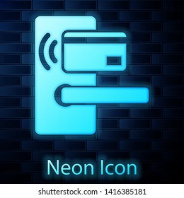 Glowing neon Digital door lock with wireless technology for unlock icon isolated on brick wall background. Door handle sign. Security smart home of concept. Vector Illustration