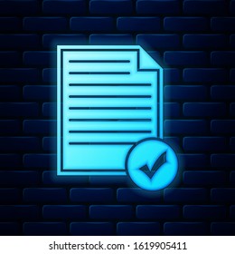 Glowing neon Document and check mark icon isolated on brick wall background. Checklist icon. Business concept.  Vector Illustration