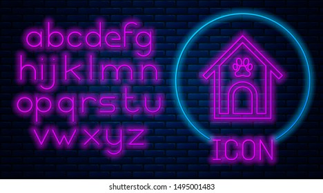Glowing neon Dog house and paw print pet icon isolated on brick wall background. Dog kennel. Neon light alphabet. Vector Illustration