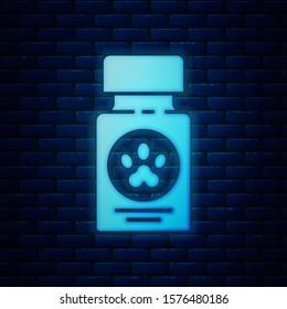 Glowing neon Dog medicine bottle and pills icon isolated on brick wall background. Container with pills. Prescription medicine for animal.  Vector Illustration